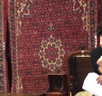 A Persian Bidjar carpet with Medallion and Pendants according to the auction description and certificate.