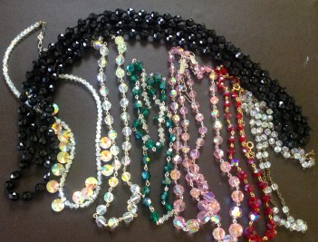 Vintage crystal necklaces to sparkle up the shop.